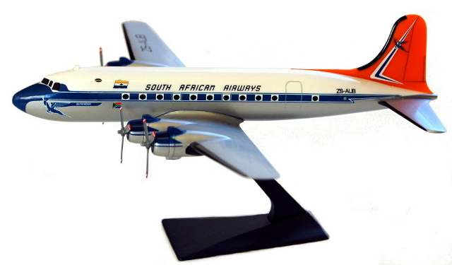 A model airplane on a stand

Description automatically generated