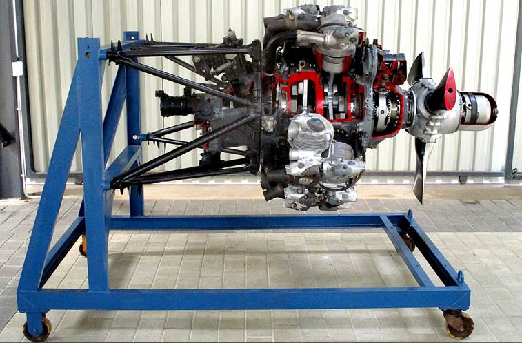 A large engine on a stand

Description automatically generated