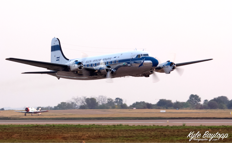 A large air plane on a runway

Description automatically generated