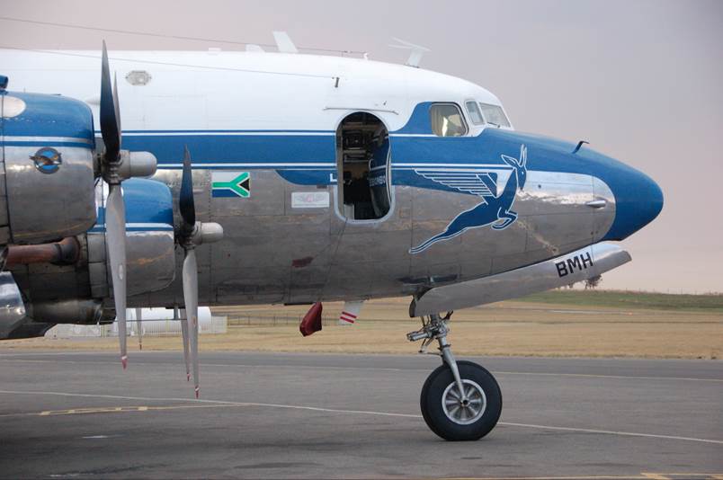 Close-up of a plane on the runway

Description automatically generated