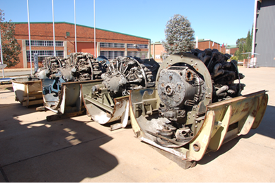 Several machines outside on a sunny day

Description automatically generated