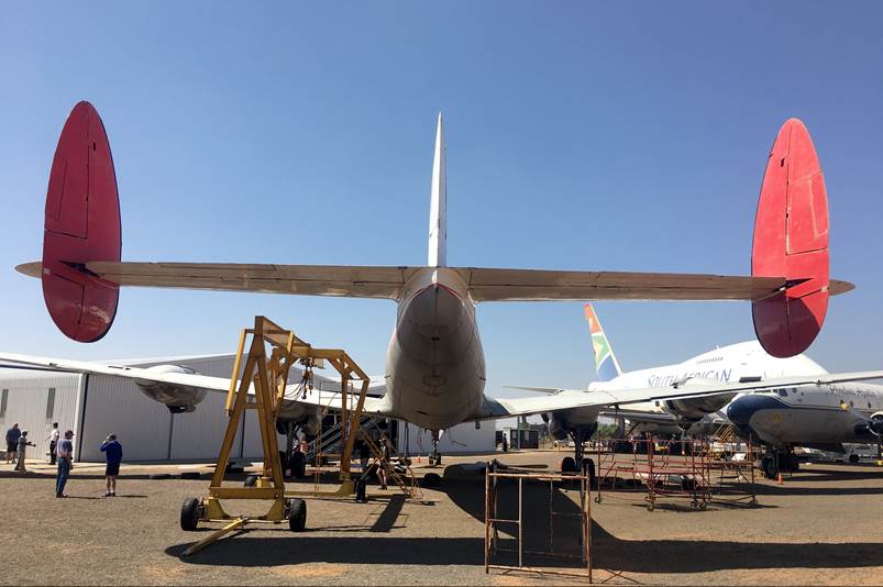 A plane parked at an airport

Description automatically generated