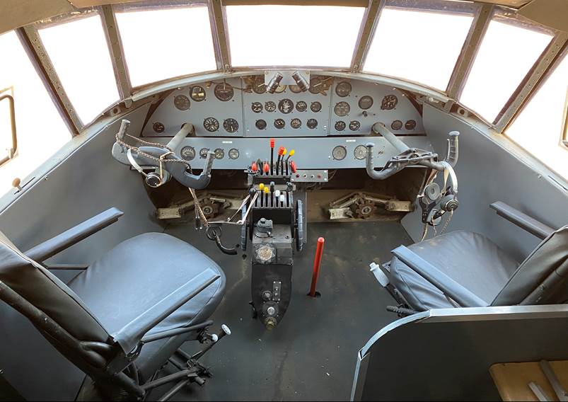 A cockpit of a plane

Description automatically generated