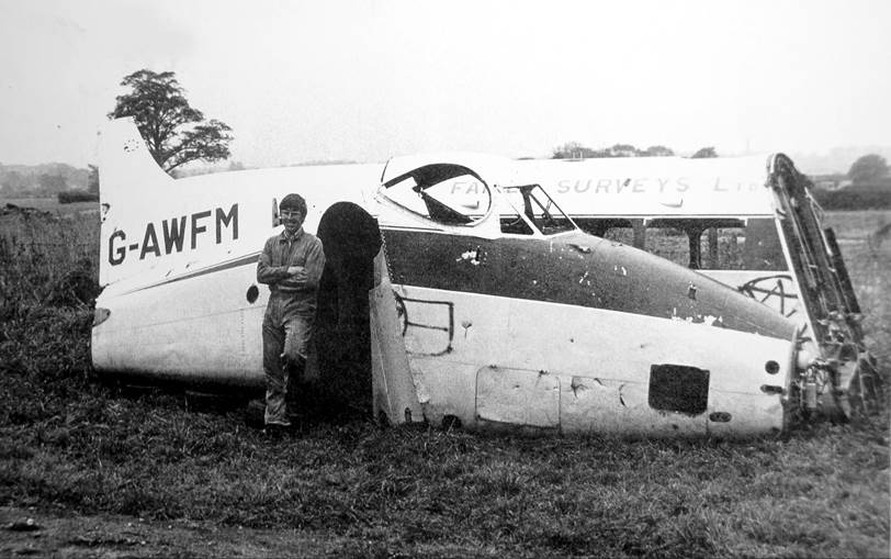 A person standing next to an airplane

Description automatically generated