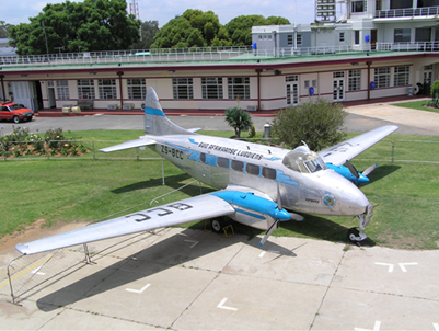 A plane parked on the ground

Description automatically generated