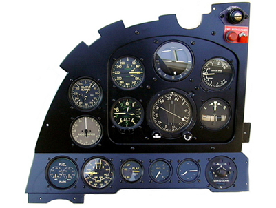 A close-up of a cockpit panel

Description automatically generated