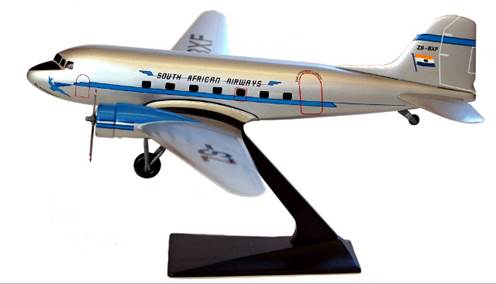 A model airplane on a stand

Description automatically generated